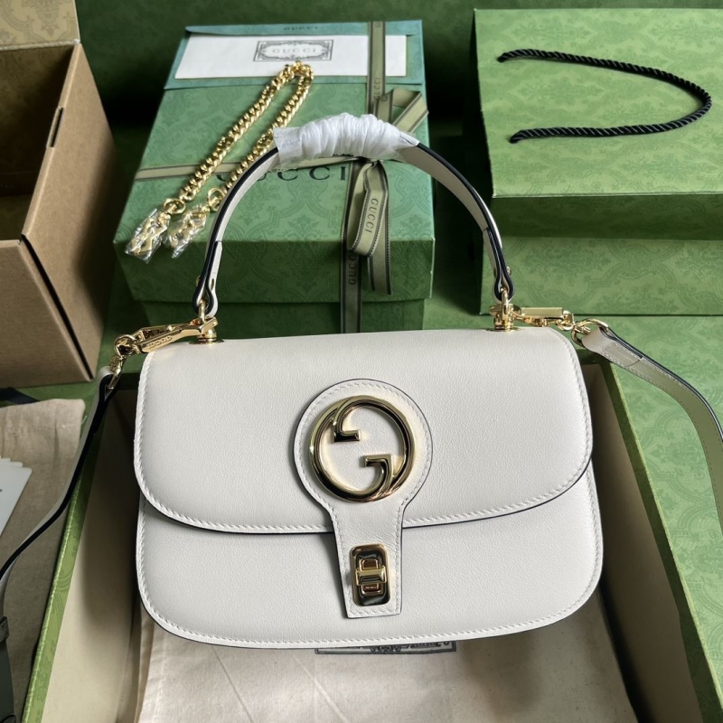 G*u*i top handle bags
